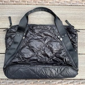Large Black Puffy Satchel, Zippers closed. New, 21" W x 13" L x 6" D